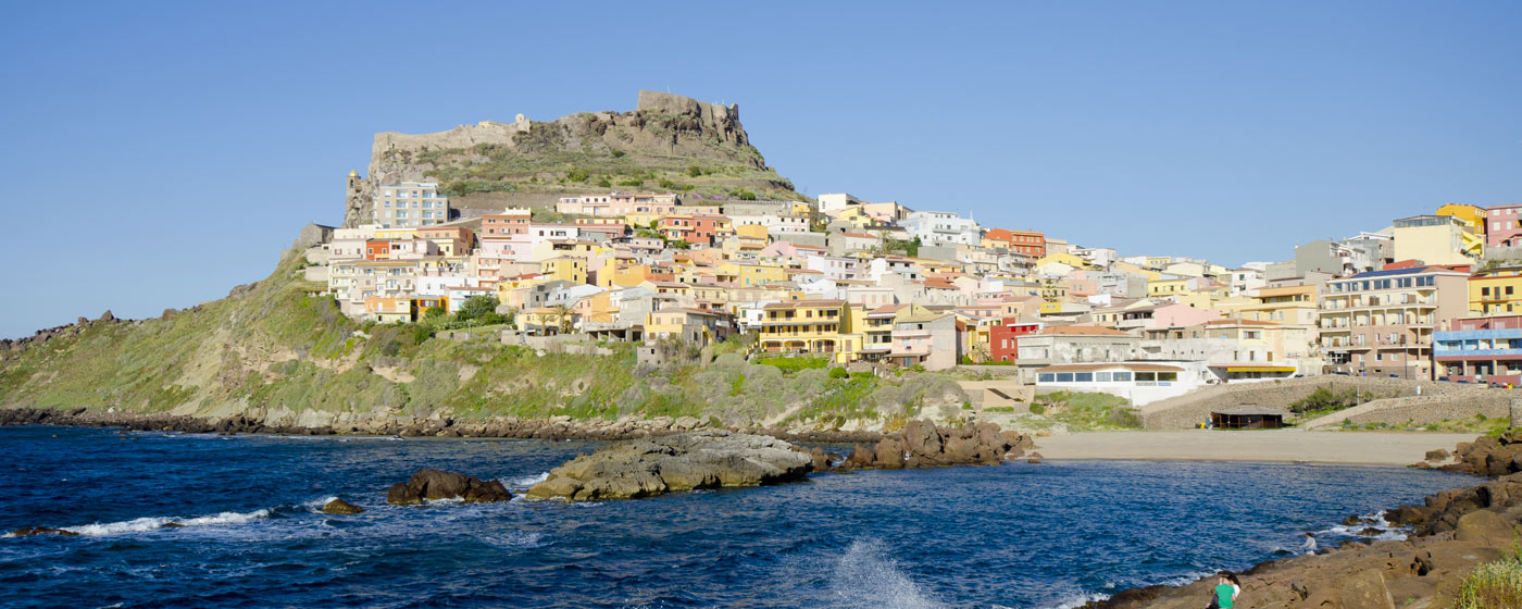 the village of Isola Rossa seen from the sea